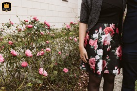 Guests in formal attire blend with the ornate interior of Schloss Lamberg in Steyr, Austria. The wedding photo captures a moment of coordinated elegance.